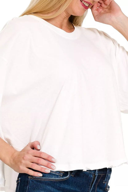 White Zenana cotton round neck short sleeve T-shirt, casual women's top from Trendsi, displayed on a plain background.