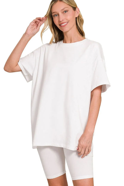 White Zenana cotton round neck top paired with matching biker shorts, casual and comfortable loungewear set.