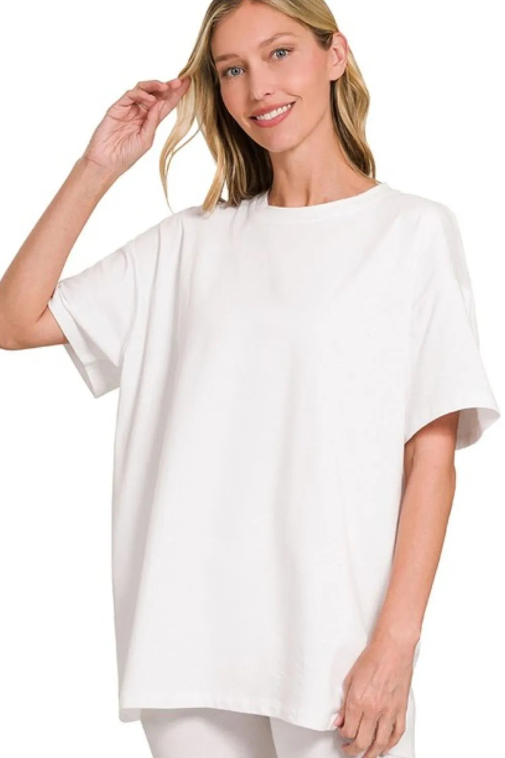 White Zenana cotton round neck top paired with matching biker shorts, casual comfortable loungewear from Trendsi.