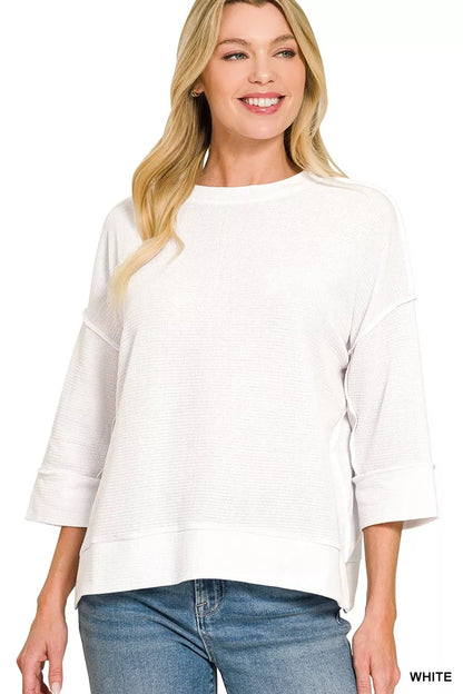 White Zenana double knit 3/4 sleeve top with a relaxed fit, featuring a round neckline and soft fabric.