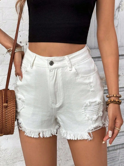 White distressed raw hem high-rise denim shorts by Trendsi, featuring a raw hem and classic high-rise fit.
