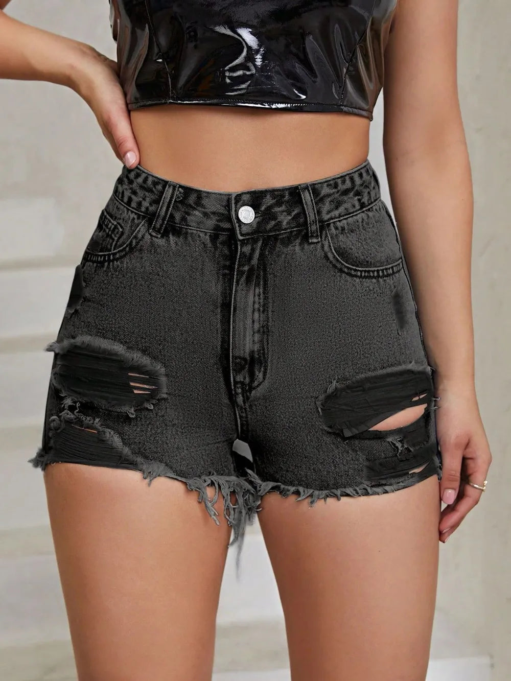 White distressed raw hem high-rise denim shorts by Trendsi, featuring a fitted waist and frayed hem detail.