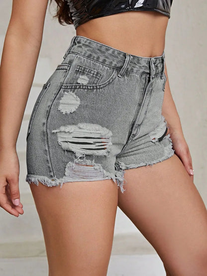 White distressed raw hem high-rise denim shorts from Trendsi, featuring a casual fit and frayed hem detail.