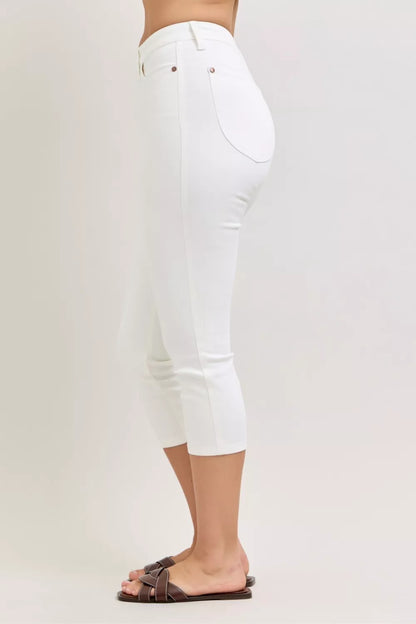 White Judy Blue high waist capri pants with extended waistband and spade pockets, stylish and comfortable for casual wear.