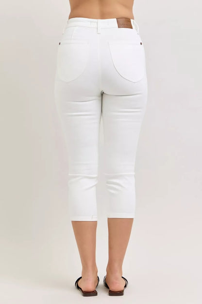 White Judy Blue high waist capri pants with extended waistband and spade pockets, stylish and comfortable for casual wear.