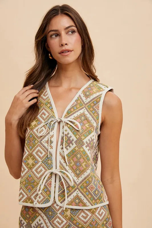 Yellow and green multicolor Annie Wear ethnic woven jacquard tie-front vest with intricate pattern details.