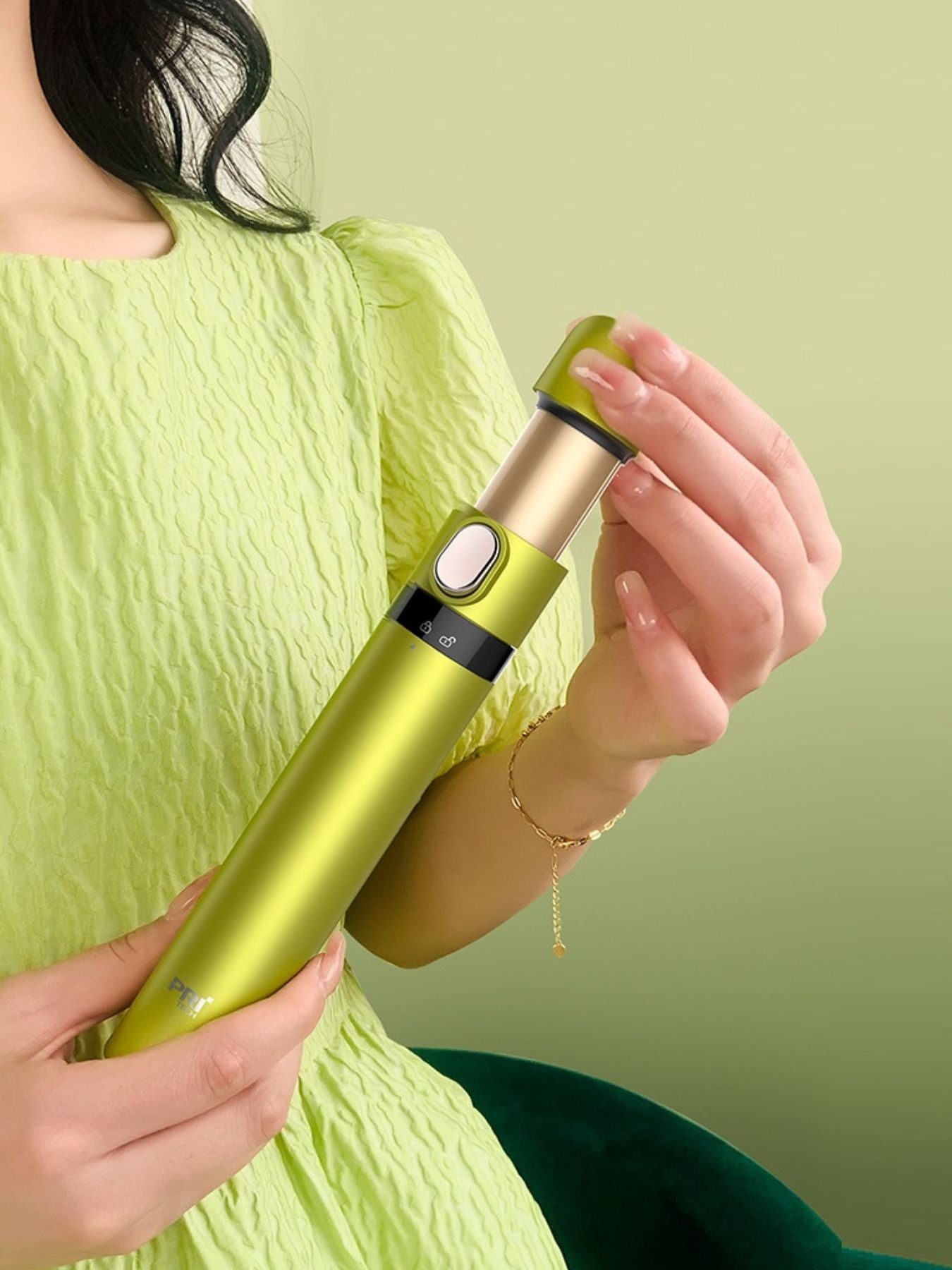 Yellow and green portable hair curling iron by Trendsi with one size barrel, compact design for easy styling on the go.