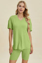 Yellow-green ribbed V-neck short sleeve top and matching shorts set by Trendsi, casual and comfortable loungewear.