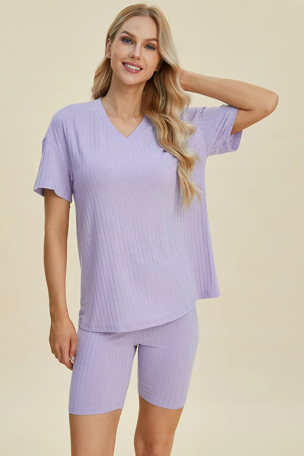 Yellow-green ribbed V-neck short sleeve top and matching shorts set by Trendsi, casual and comfortable full-size loungewear.