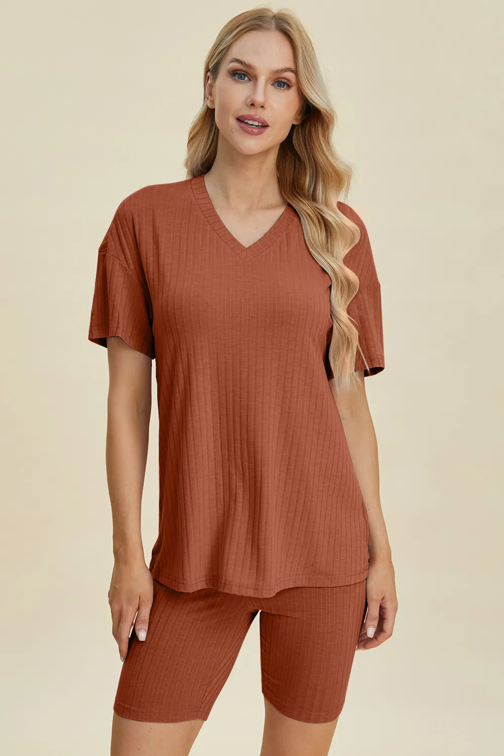 Yellow-green ribbed V-neck short sleeve top and matching shorts set by Trendsi, casual and comfortable summer outfit.
