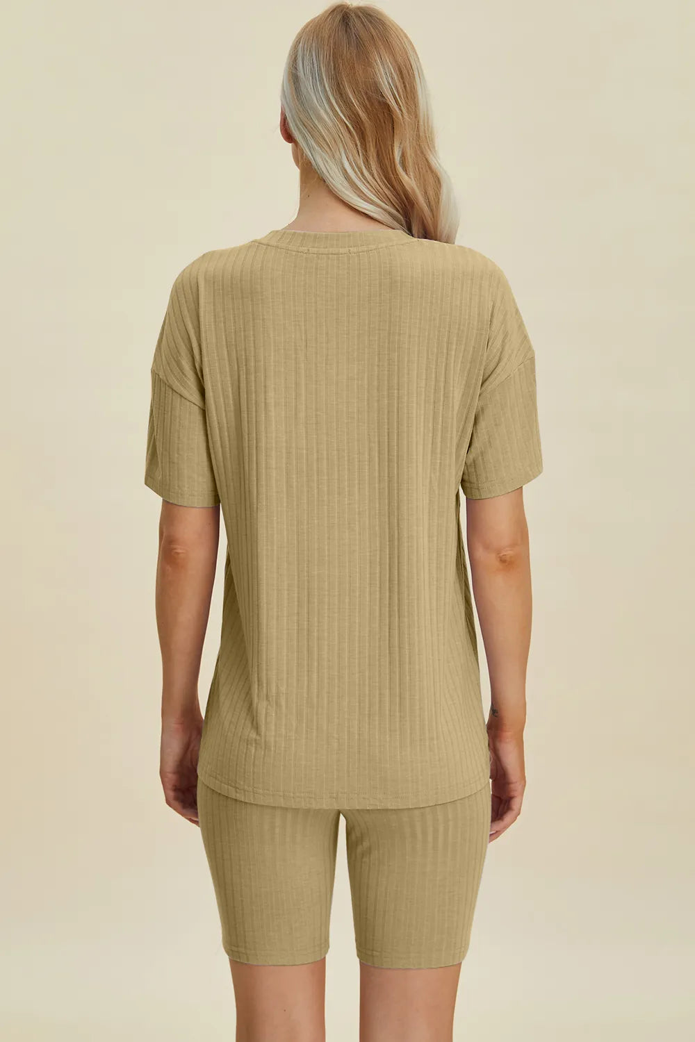 Yellow-green ribbed V-neck short sleeve top and matching shorts set by Trendsi, casual and comfortable for warm weather.