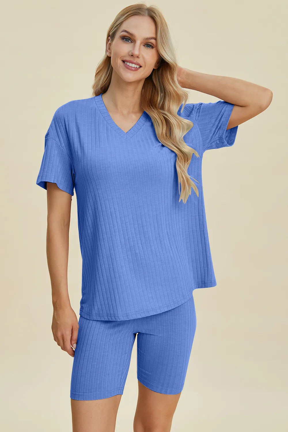 Yellow-green ribbed V-neck short sleeve top and matching shorts set by Trendsi, casual and comfortable summer outfit.