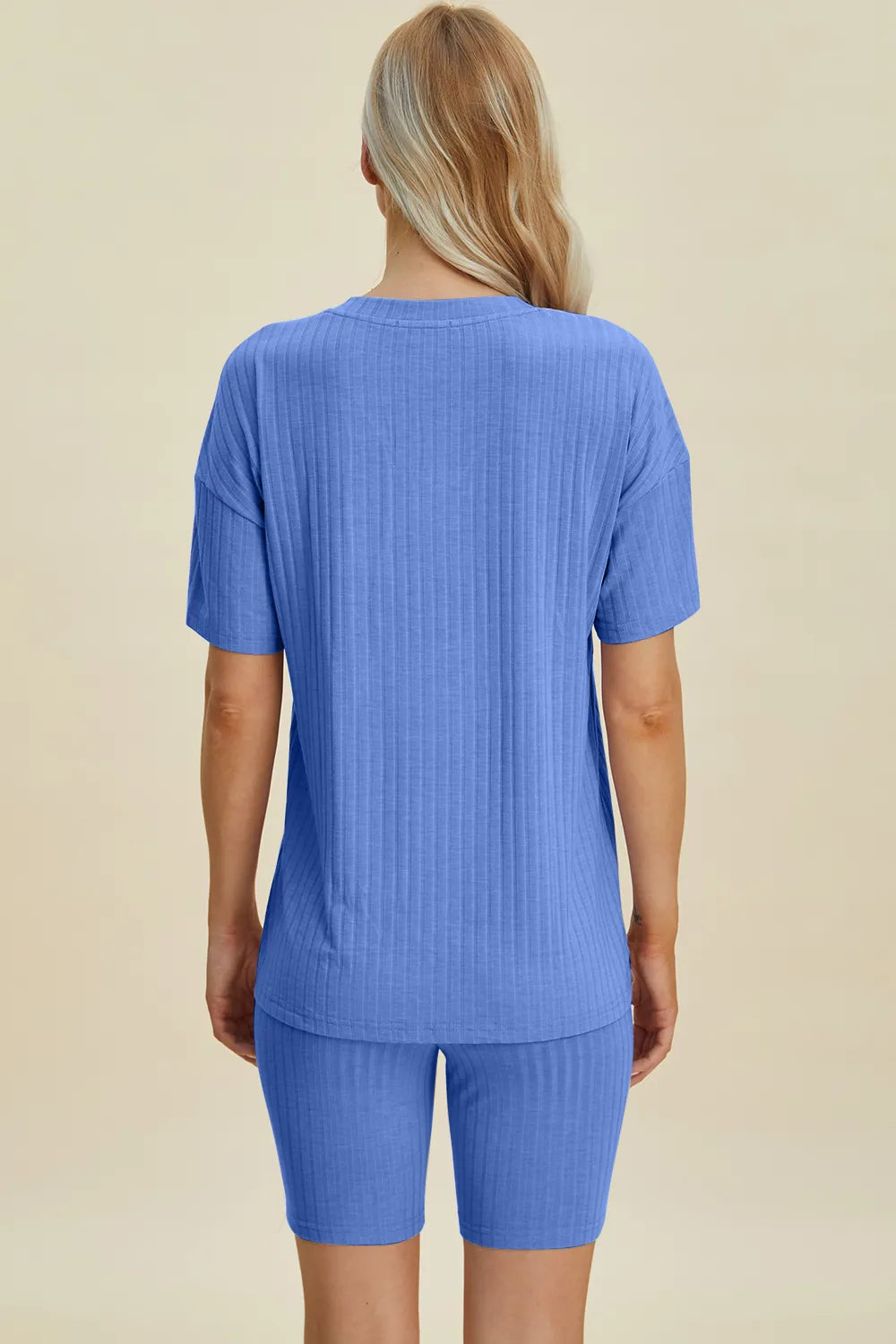 Yellow-green ribbed V-neck short sleeve top and matching shorts set from Trendsi, casual and comfortable summer outfit.
