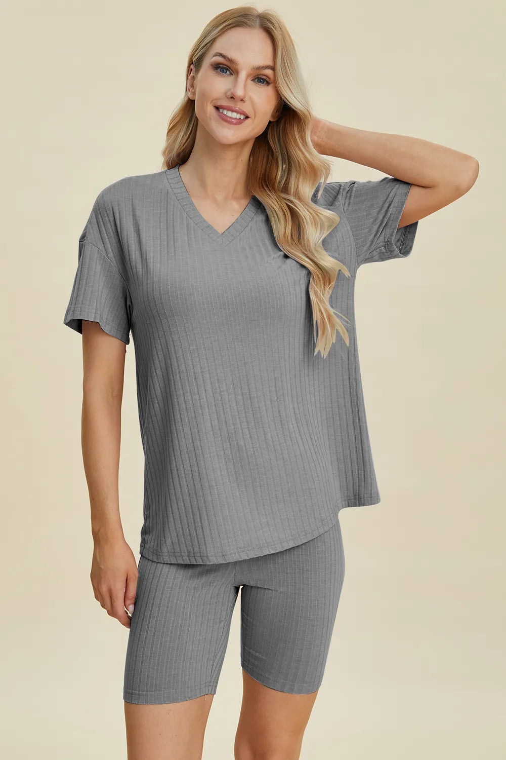 Yellow-green ribbed V-neck short sleeve top and matching shorts set from Trendsi, casual and comfortable summer outfit.