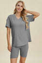 Yellow-green ribbed V-neck short sleeve top and matching shorts set from Trendsi, casual and comfortable summer outfit.
