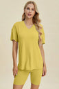 Yellow-green ribbed V-neck short sleeve top and matching shorts set by Trendsi, casual and comfortable summer outfit.