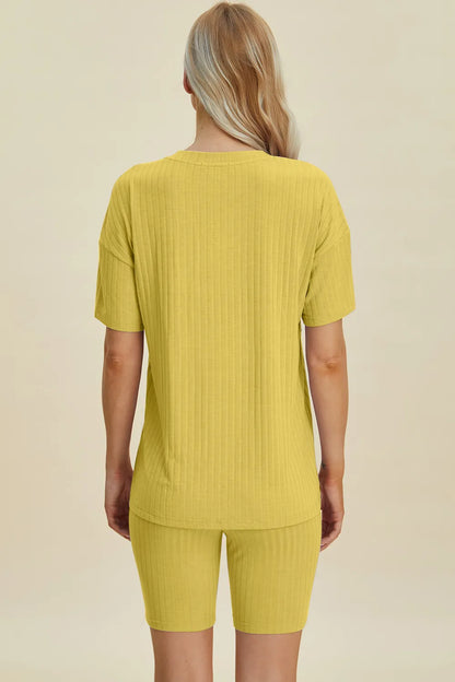 Yellow-green ribbed V-neck short sleeve top and matching shorts set by Trendsi, casual and comfortable full-size loungewear ensemble.