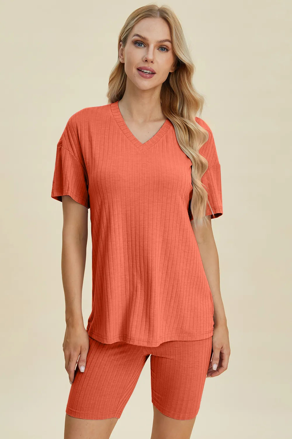 Yellow-green ribbed V-neck short sleeve top and matching shorts set from Trendsi, casual and comfortable summer outfit.