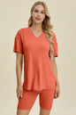 Yellow-green ribbed V-neck short sleeve top and matching shorts set from Trendsi, casual and comfortable summer outfit.