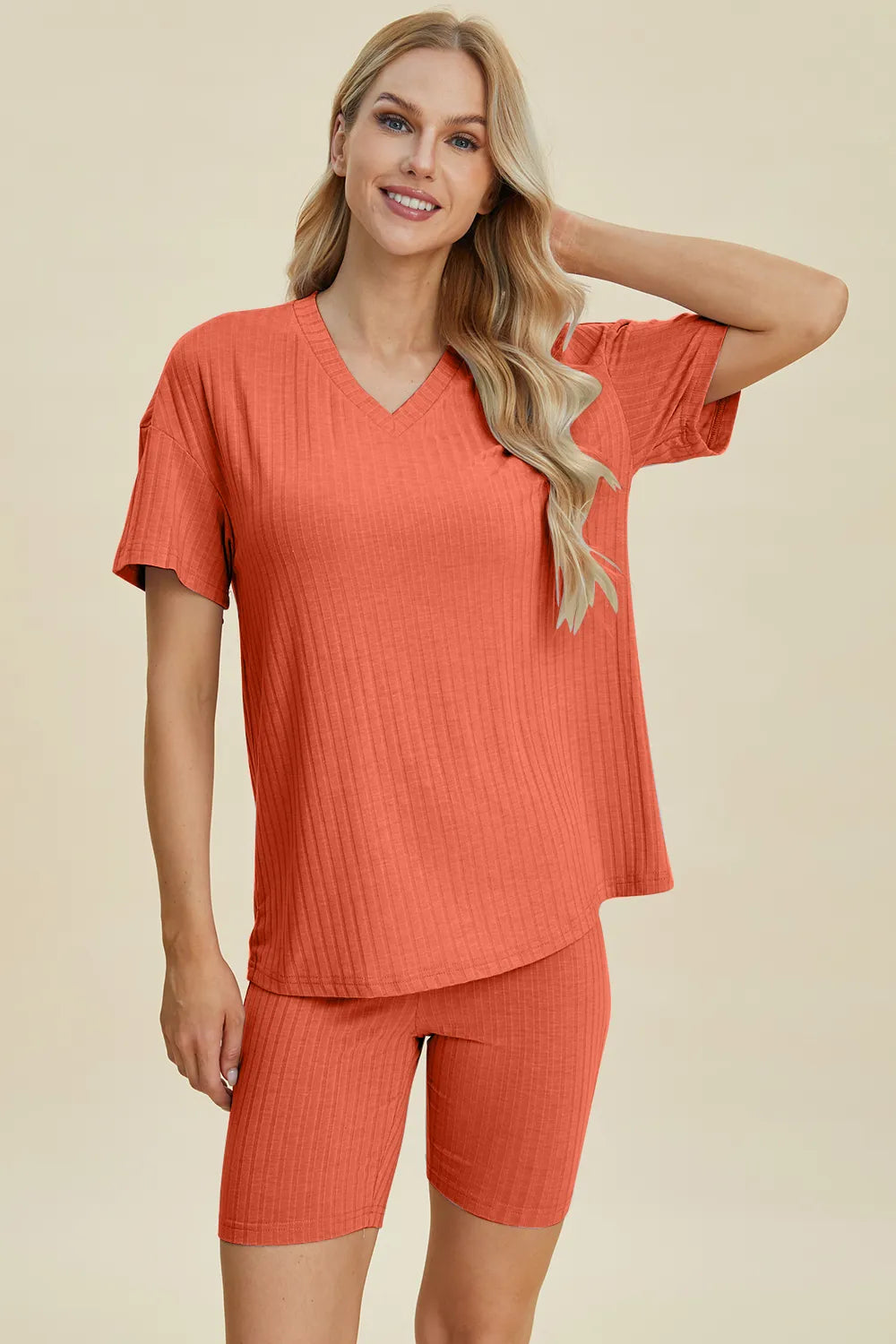 Yellow-green ribbed V-neck short sleeve top and matching shorts set by Trendsi, casual summer loungewear ensemble.