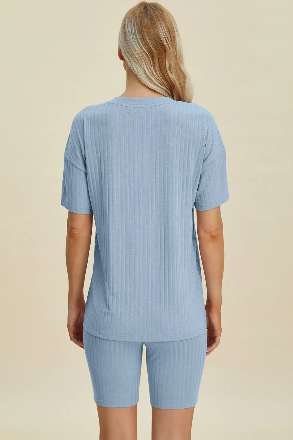 Yellow-green ribbed V-neck short sleeve top and matching shorts set by Trendsi, casual and comfortable women's loungewear.