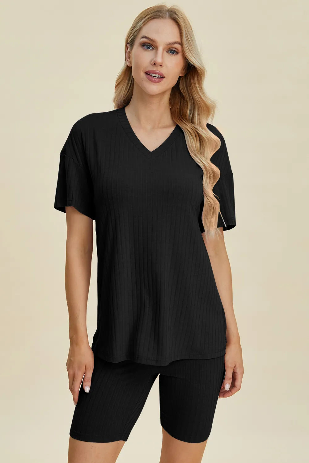 Yellow-green ribbed V-neck short sleeve top and matching shorts set by Trendsi, casual and comfortable for everyday wear.