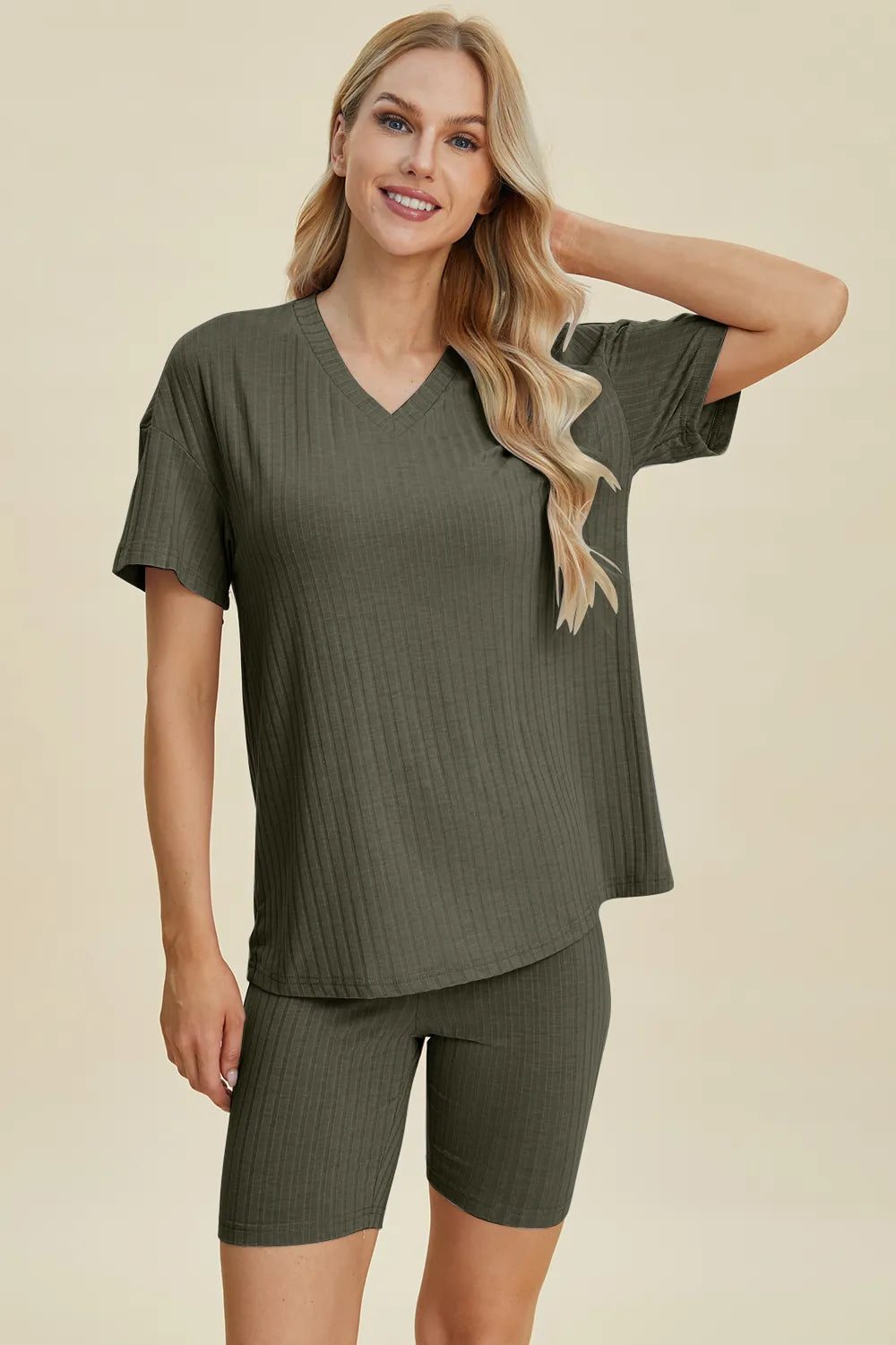 Yellow-green ribbed V-neck short sleeve top and matching shorts set from Trendsi, casual and comfortable for everyday wear.