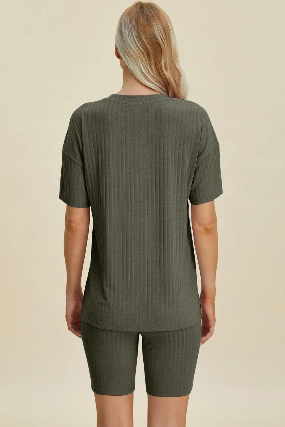 Yellow-green ribbed V-neck short sleeve top and matching shorts set by Trendsi, casual and comfortable for everyday wear.