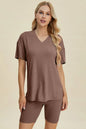 Yellow-green ribbed V-neck short sleeve top and matching shorts set from Trendsi, casual and comfortable summer outfit.