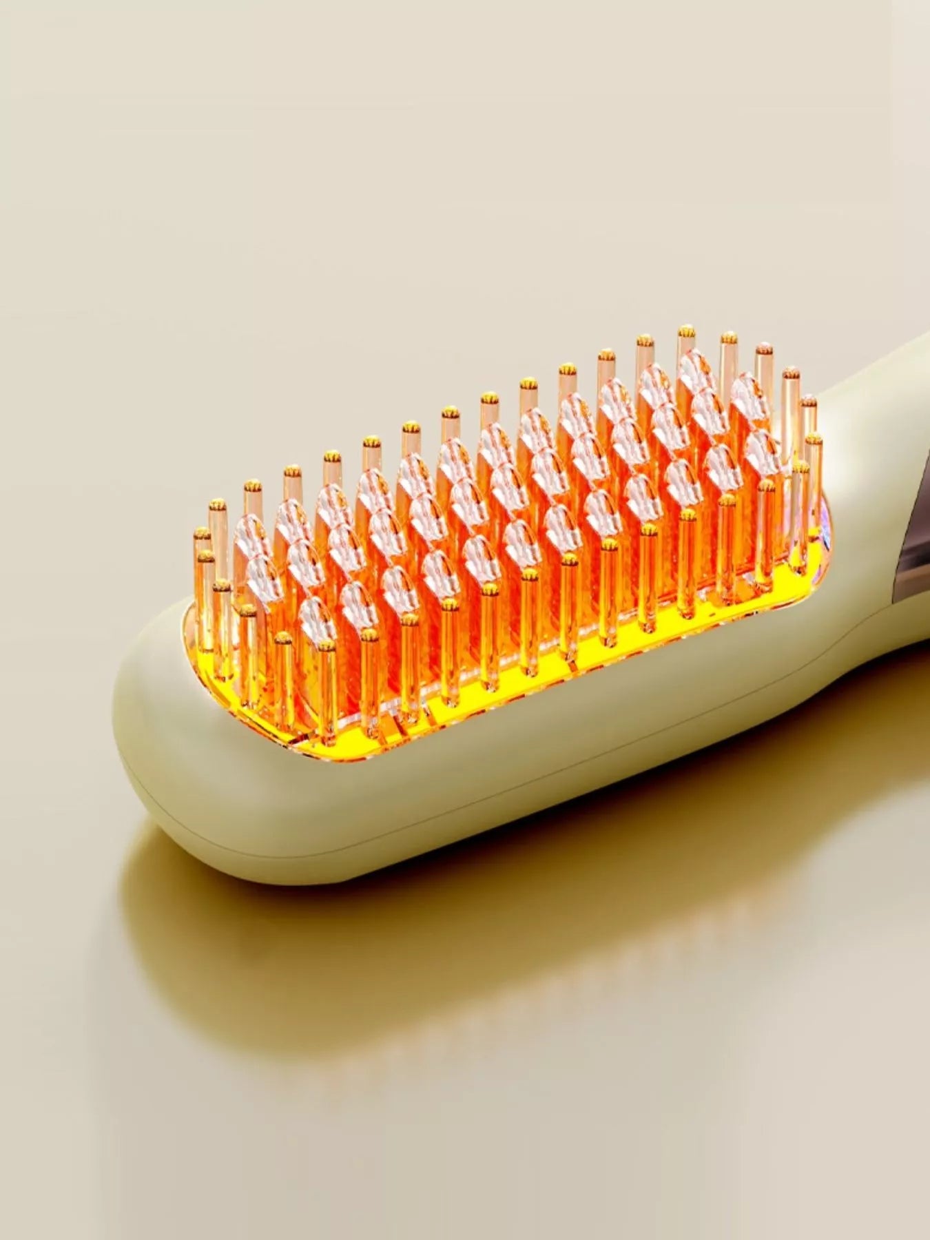 Yellow heated hair straightening comb from Trendsi, with ceramic plates and adjustable temperature for smooth styling.