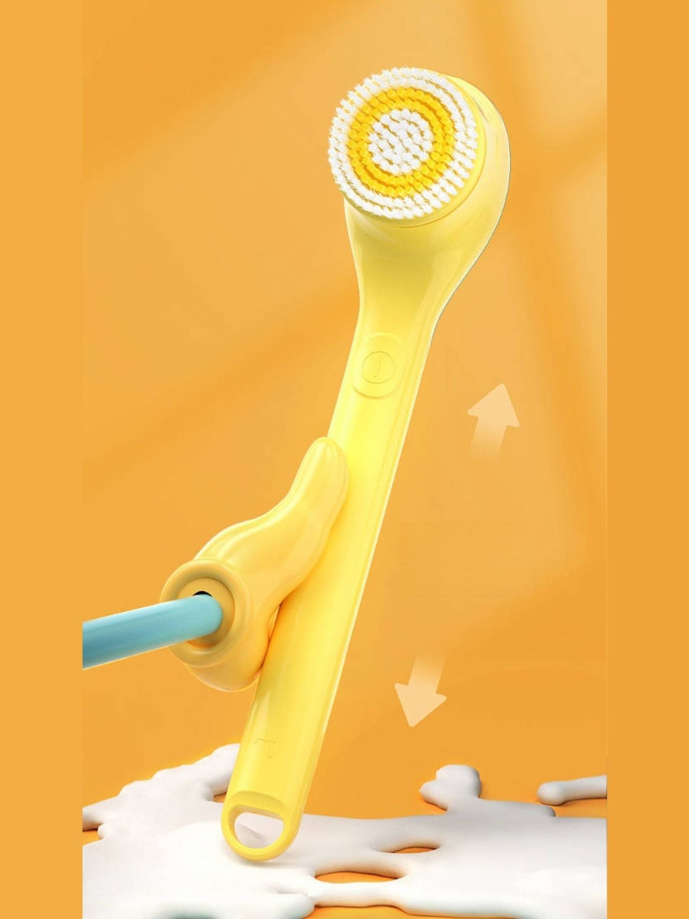 Yellow waterproof electric cleanser brush by Trendsi, with a sleek design and soft bristles for facial cleansing.