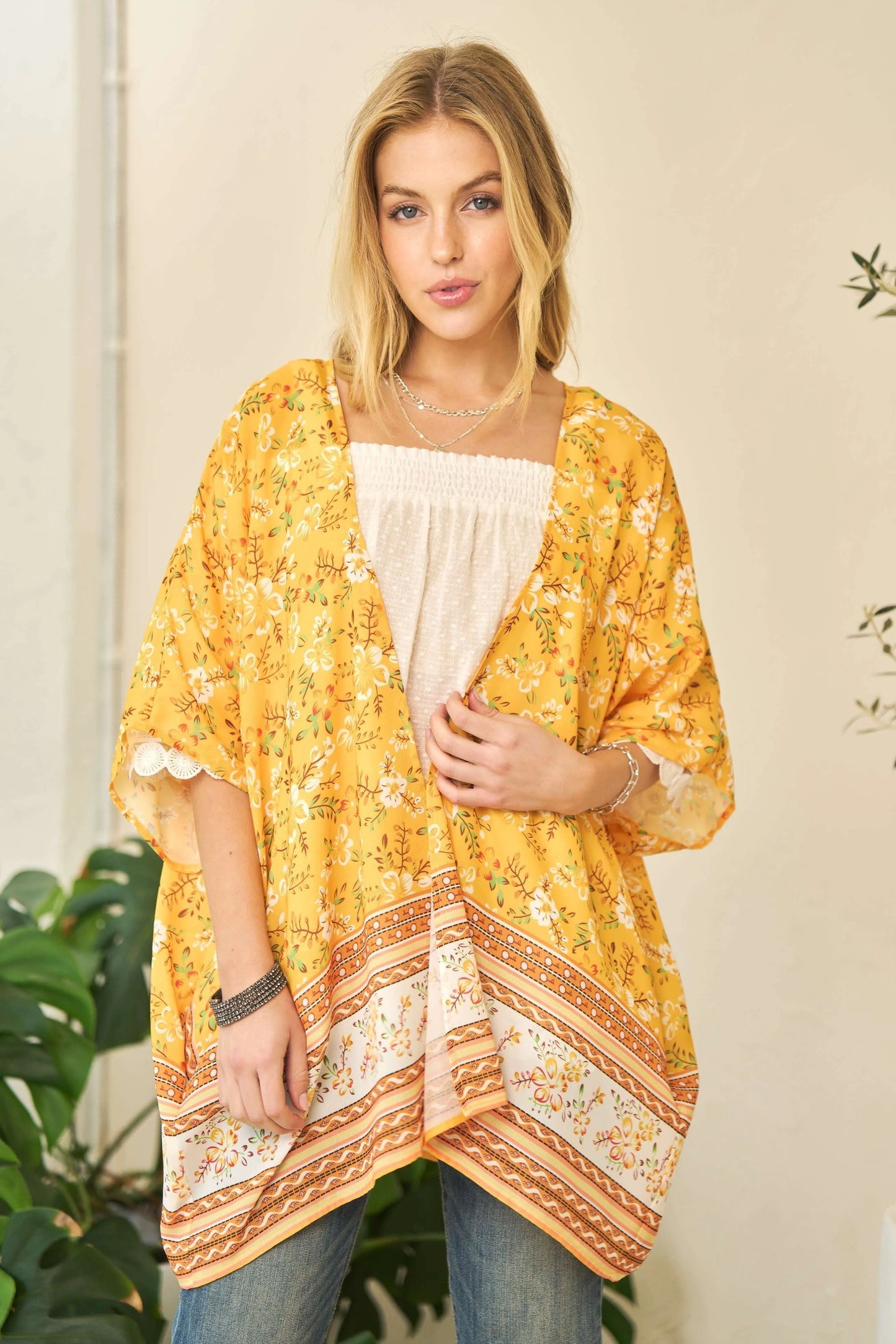 Yellow floral printed Davi & Dani short sleeve kimono cover-up with a loose fit and lightweight fabric for a breezy, stylish look.