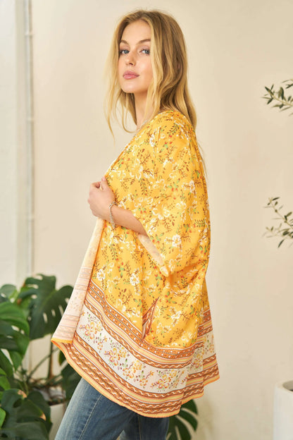 Yellow floral printed Davi & Dani short sleeve kimono cover-up with loose fit, perfect for beach or casual wear.