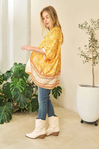 Yellow Davi & Dani floral printed short sleeve kimono cover-up with loose fit, lightweight and stylish for beach or casual wear.