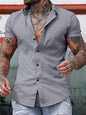 Yellow men's slim fit short sleeve button-down shirt in plus size by Trendsi, shown flat with collar and buttons visible.