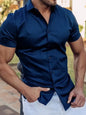 Men's yellow full-size slim fit short sleeve button-down shirt by Trendsi, showcasing a classic collar and tailored fit.