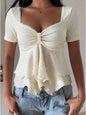 White sweetheart neck layered ruffle top from Trendsi, featuring a feminine design with layered ruffles and a fitted silhouette.
