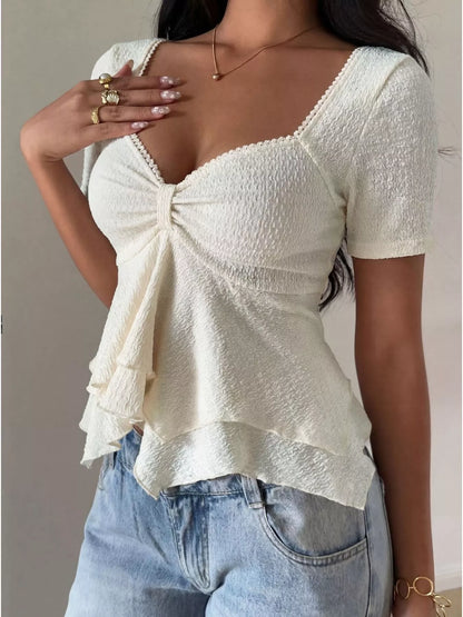 White sweetheart neck layered ruffle top from Trendsi, featuring feminine ruffle details and a stylish layered design.